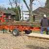 Dale Thompson of Pfafftown brought his equipment to the site to saw our hand hewn logs in half.