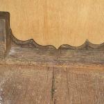 The continuous block is solid wood, usually oak, which supports the foot and runs front to back.