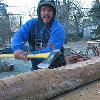 We hewed a  log into a floor joist.